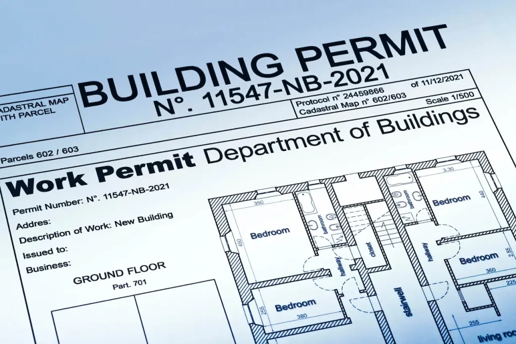 Building permit document with residential floor plan and architectural layout design.