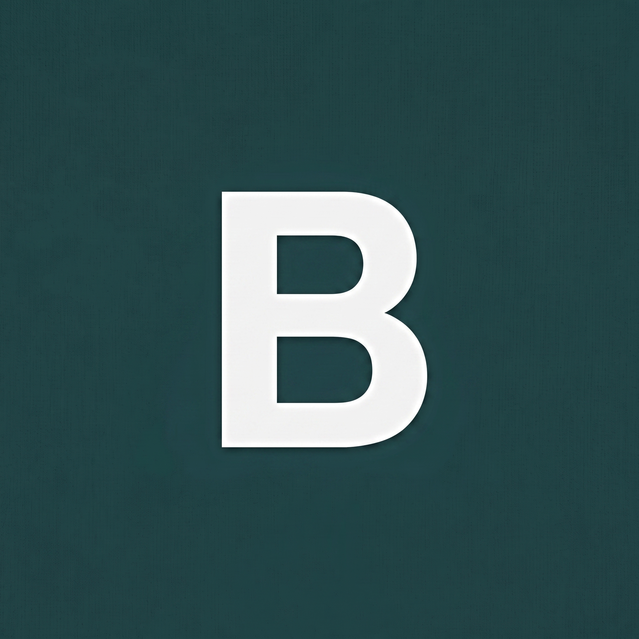 Dark teal circle with a white letter B representing Building Permit Drawing Disciplines.